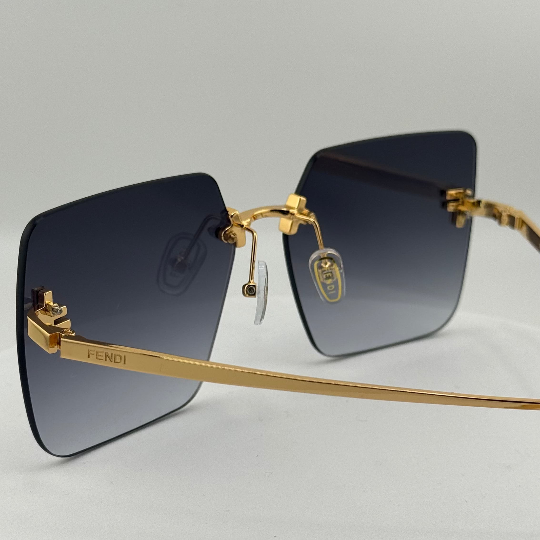 Fendi First FE4082US 30B Square Sunglasses – Gold Frame / Black Temples