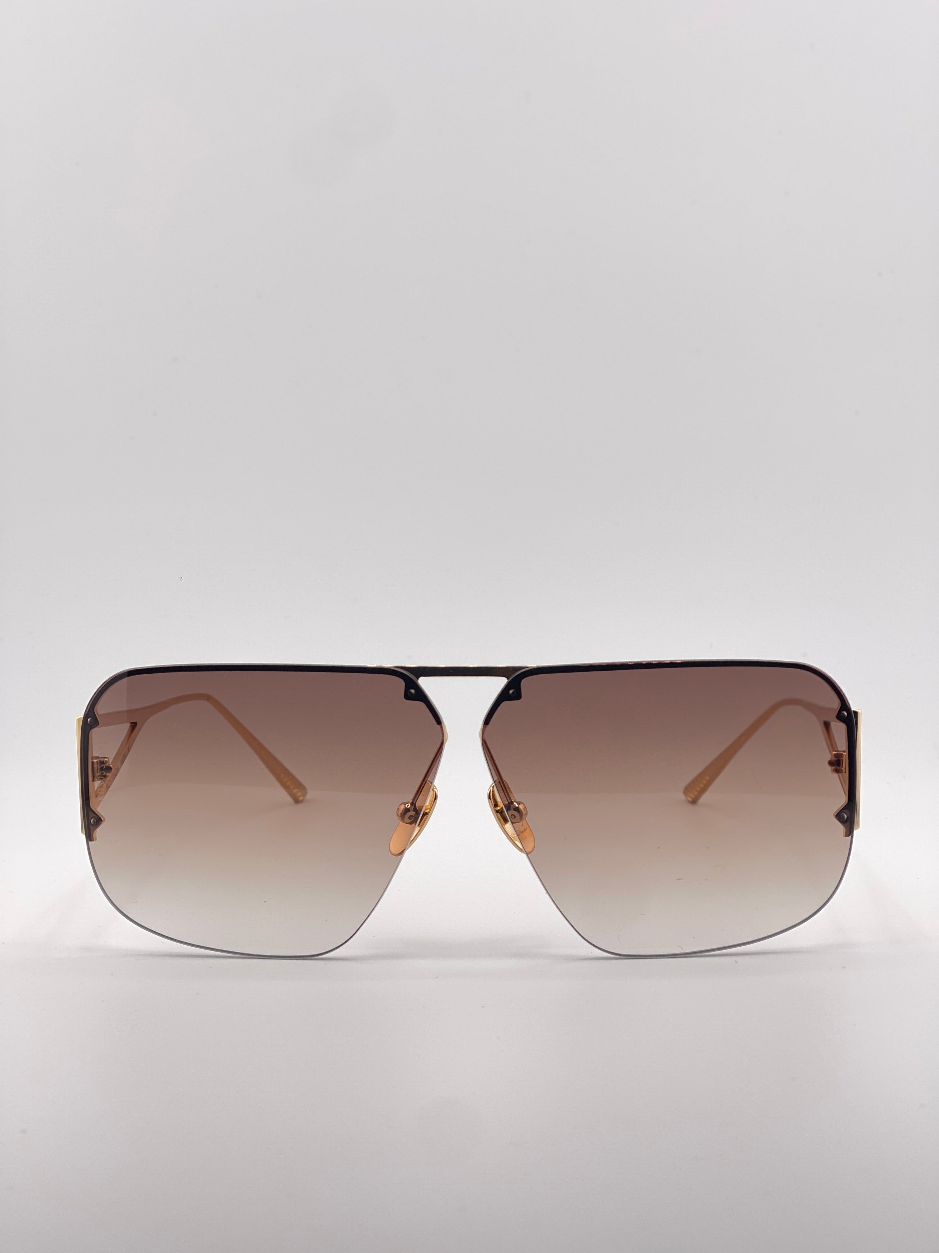 Bottega Veneta Gold Sunglasses with Black Tint – Timeless Elegance, Bold Edge