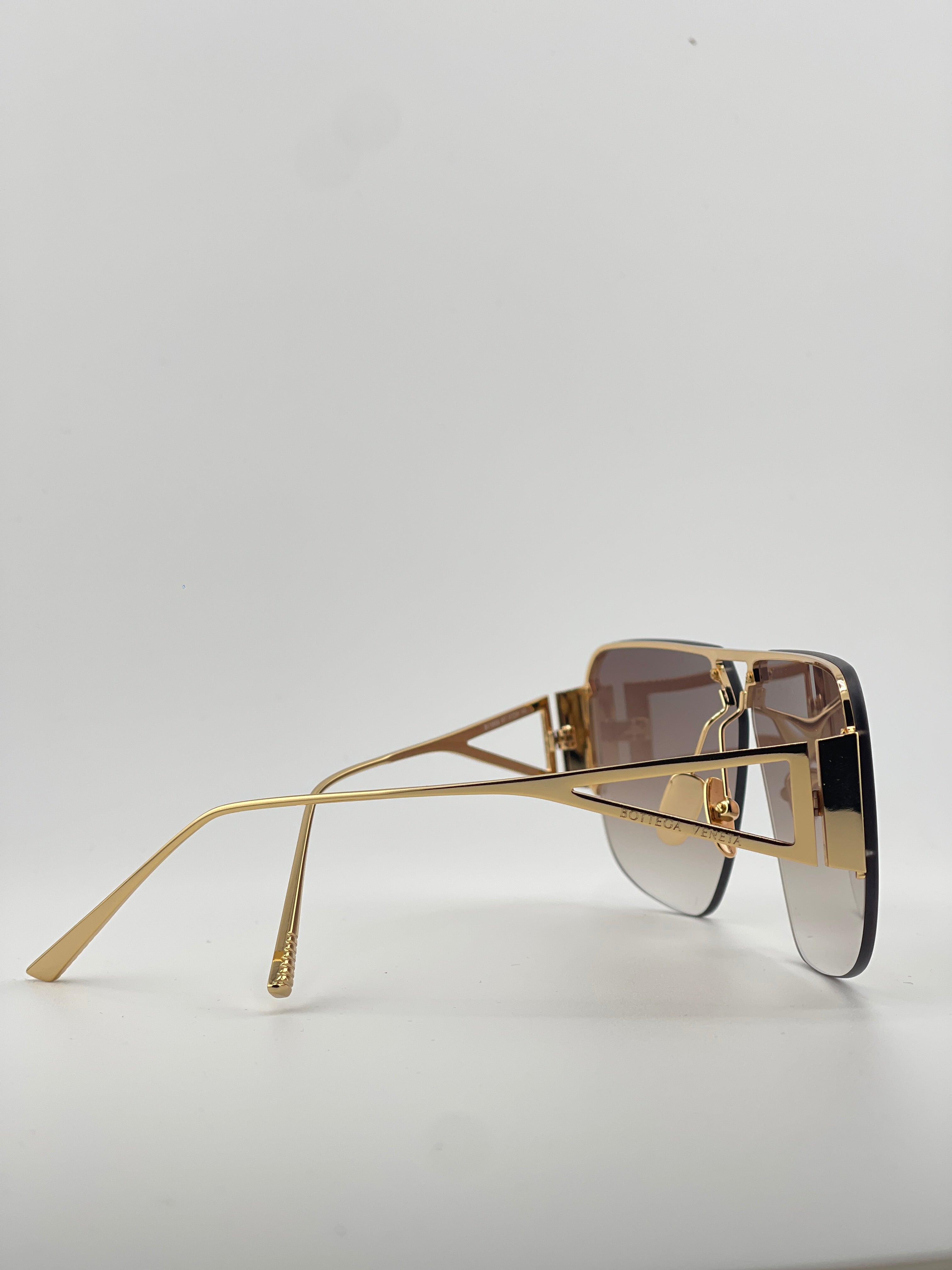 Bottega Veneta Gold Sunglasses with Black Tint – Timeless Elegance, Bold Edge