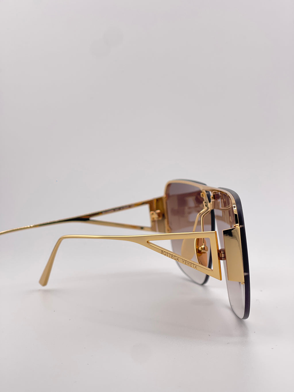 Bottega Veneta Gold Sunglasses with Black Tint – Timeless Elegance, Bold Edge