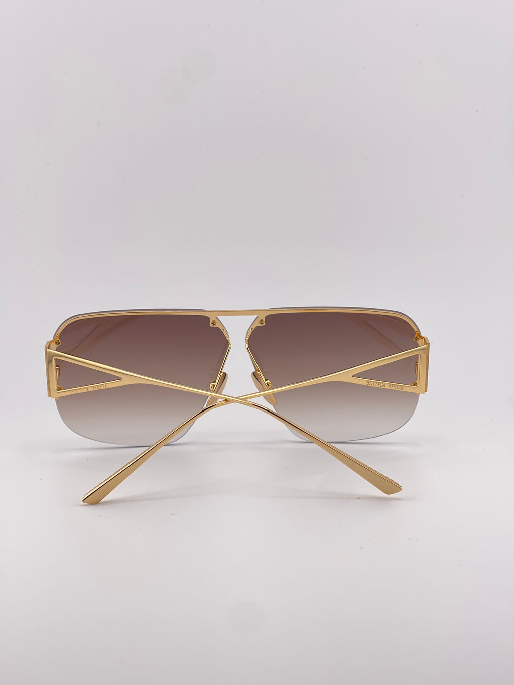 Bottega Veneta Gold Sunglasses with Black Tint – Timeless Elegance, Bold Edge