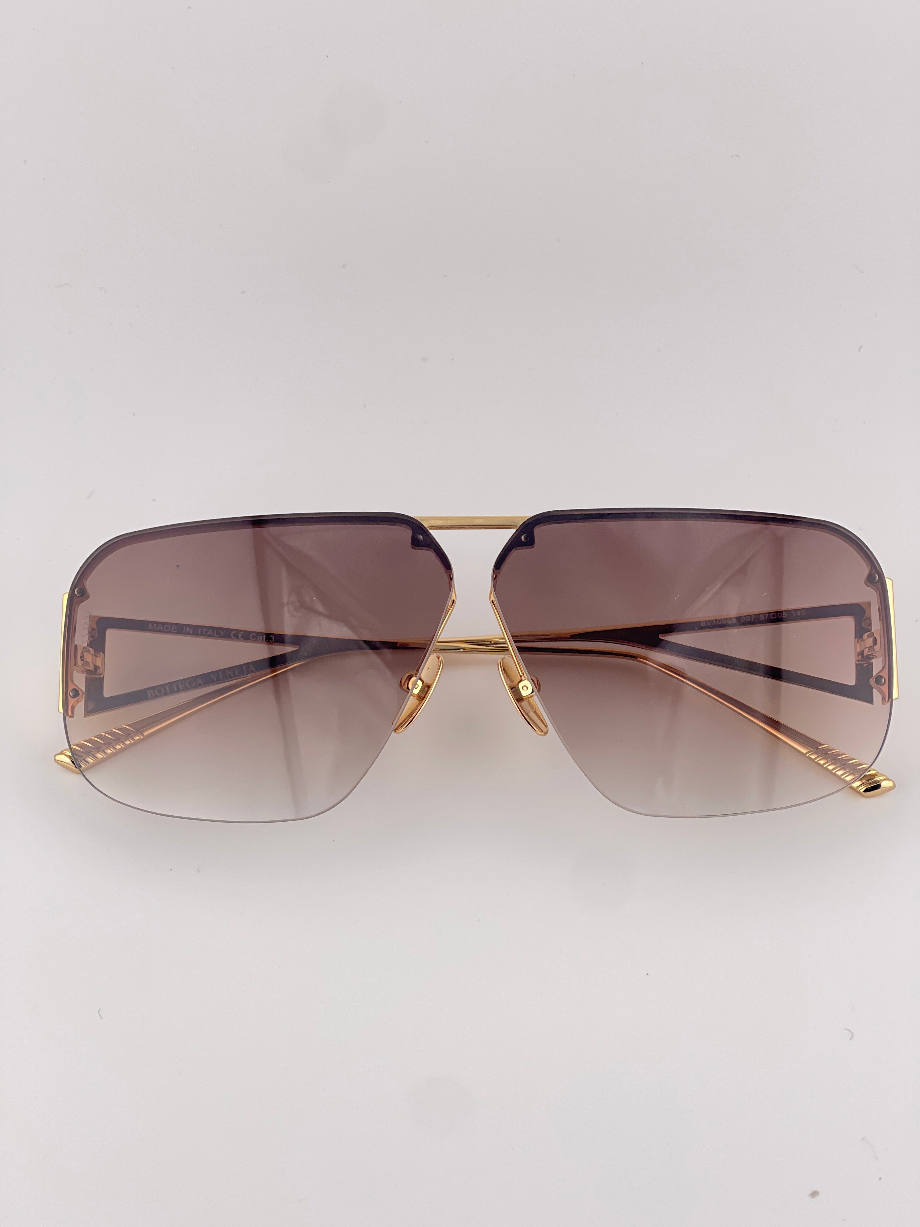 Bottega Veneta Gold Sunglasses with Black Tint – Timeless Elegance, Bold Edge