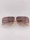 Bottega Veneta gold sunglasses black tint