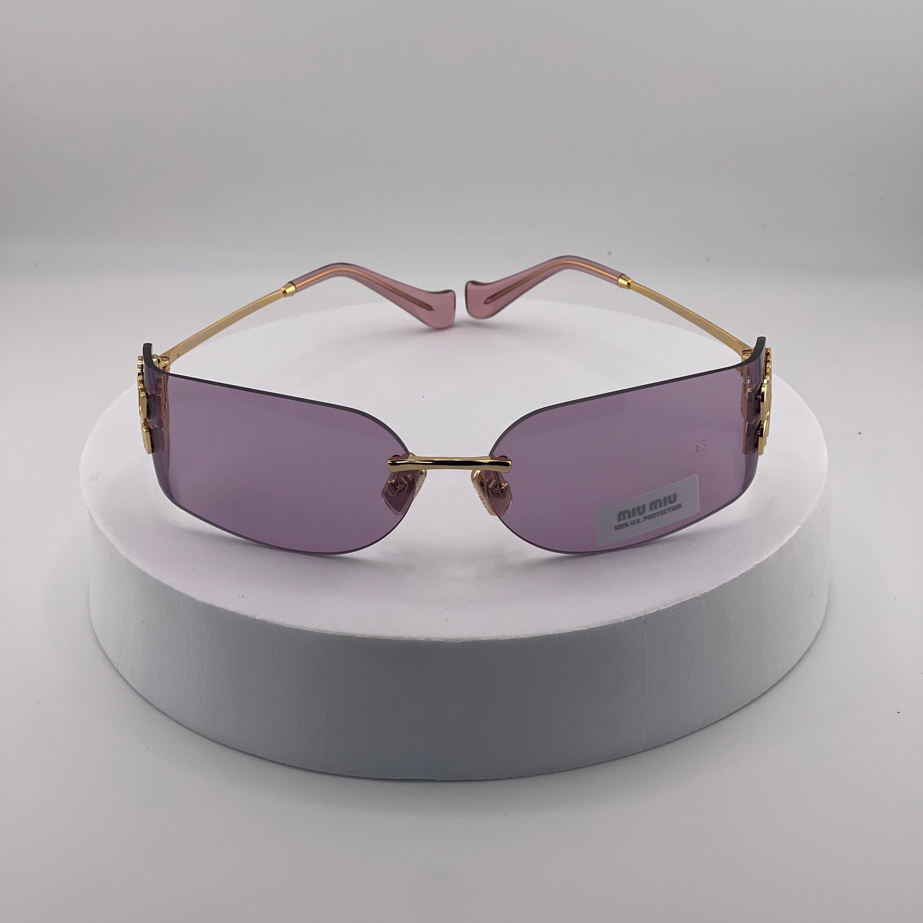 Miu Miu MU 54YS Rimless Sunglasses – Gold Frame / Purple Gradient Lens
