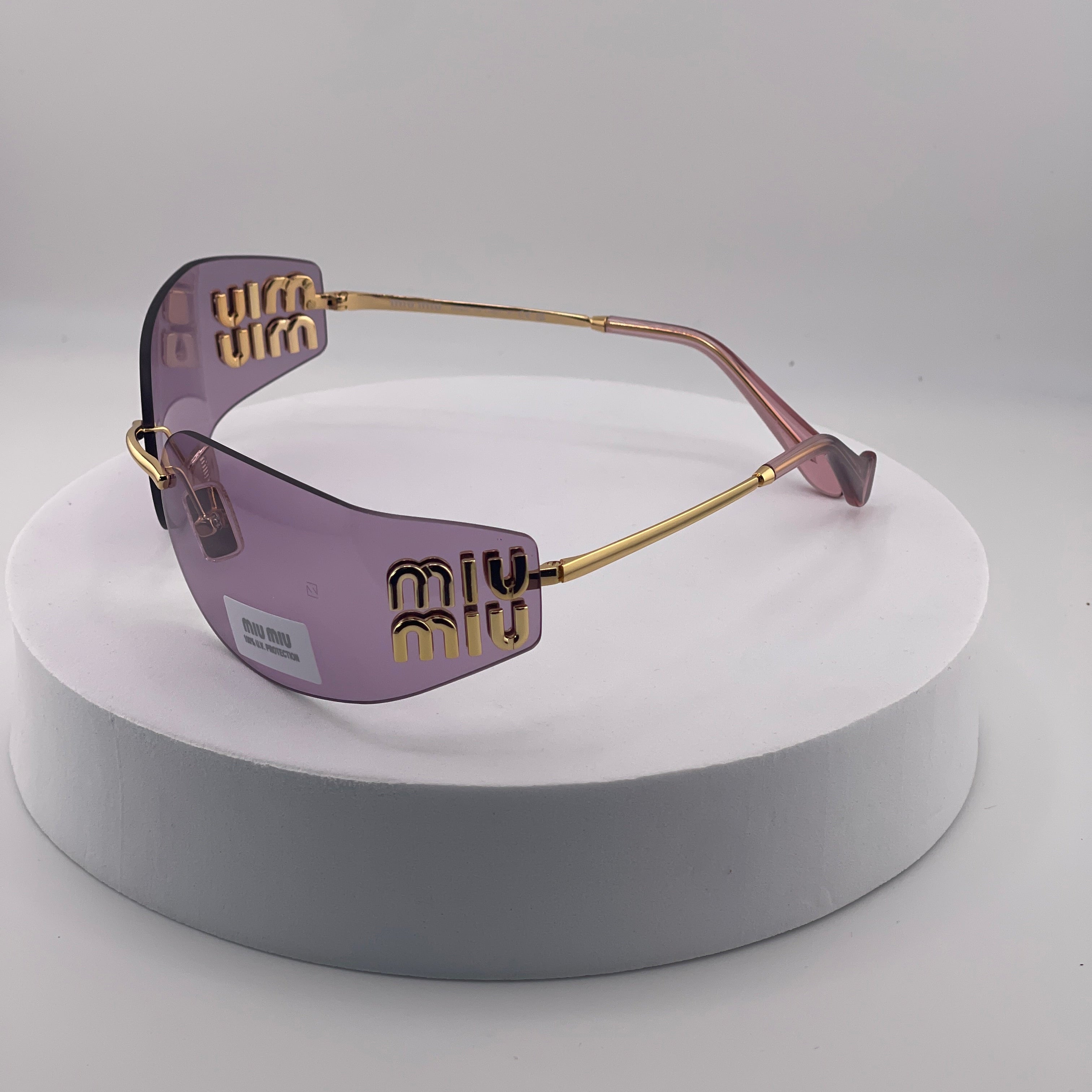 Miu Miu MU 54YS Rimless Sunglasses – Gold Frame / Purple Gradient Lens