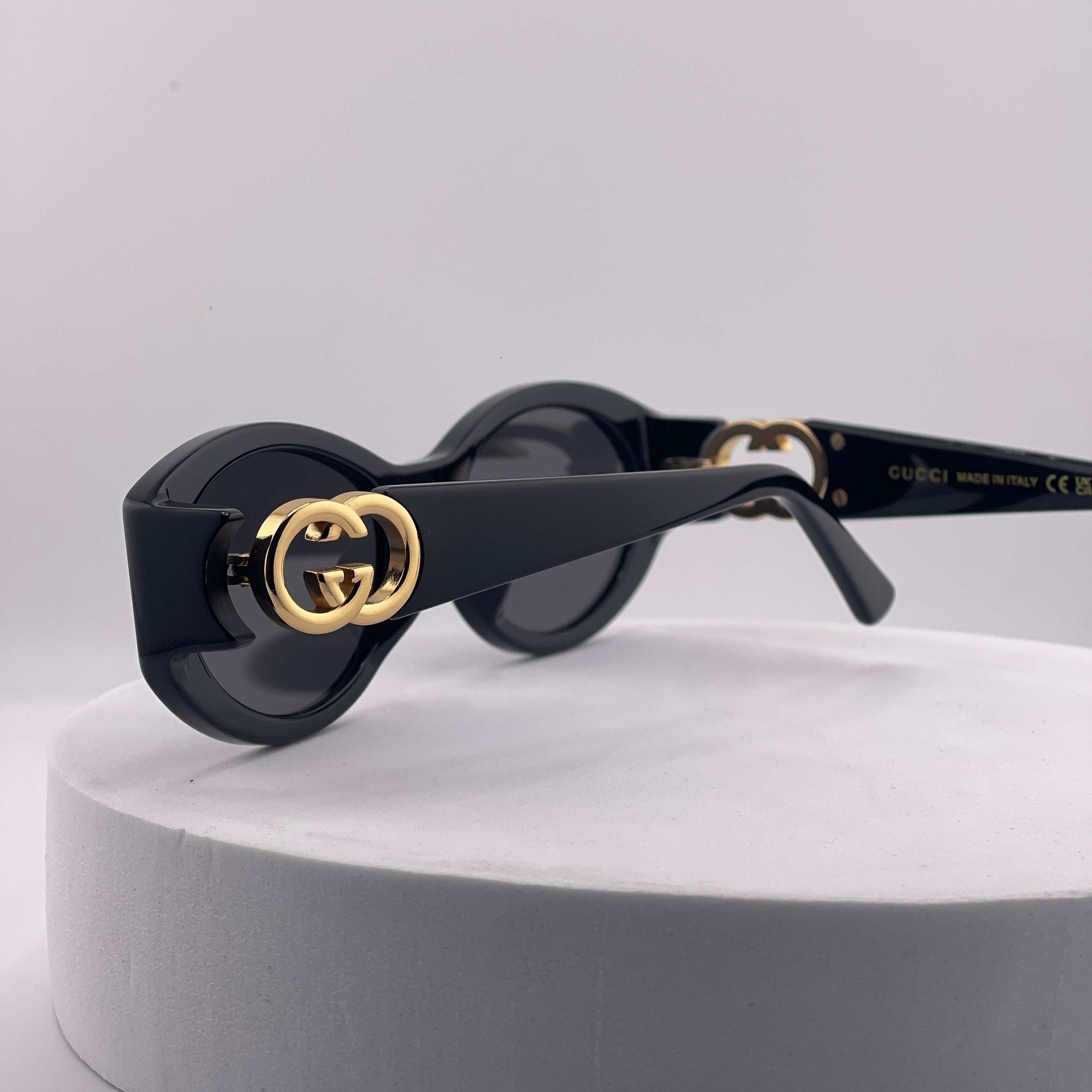 Gucci Oval Frame Sunglasses – Black & Gold
