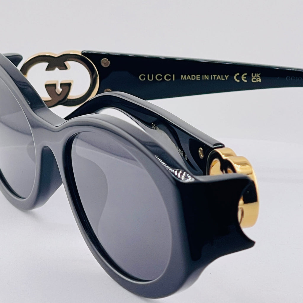 Gucci Oval Frame Sunglasses – Black & Gold