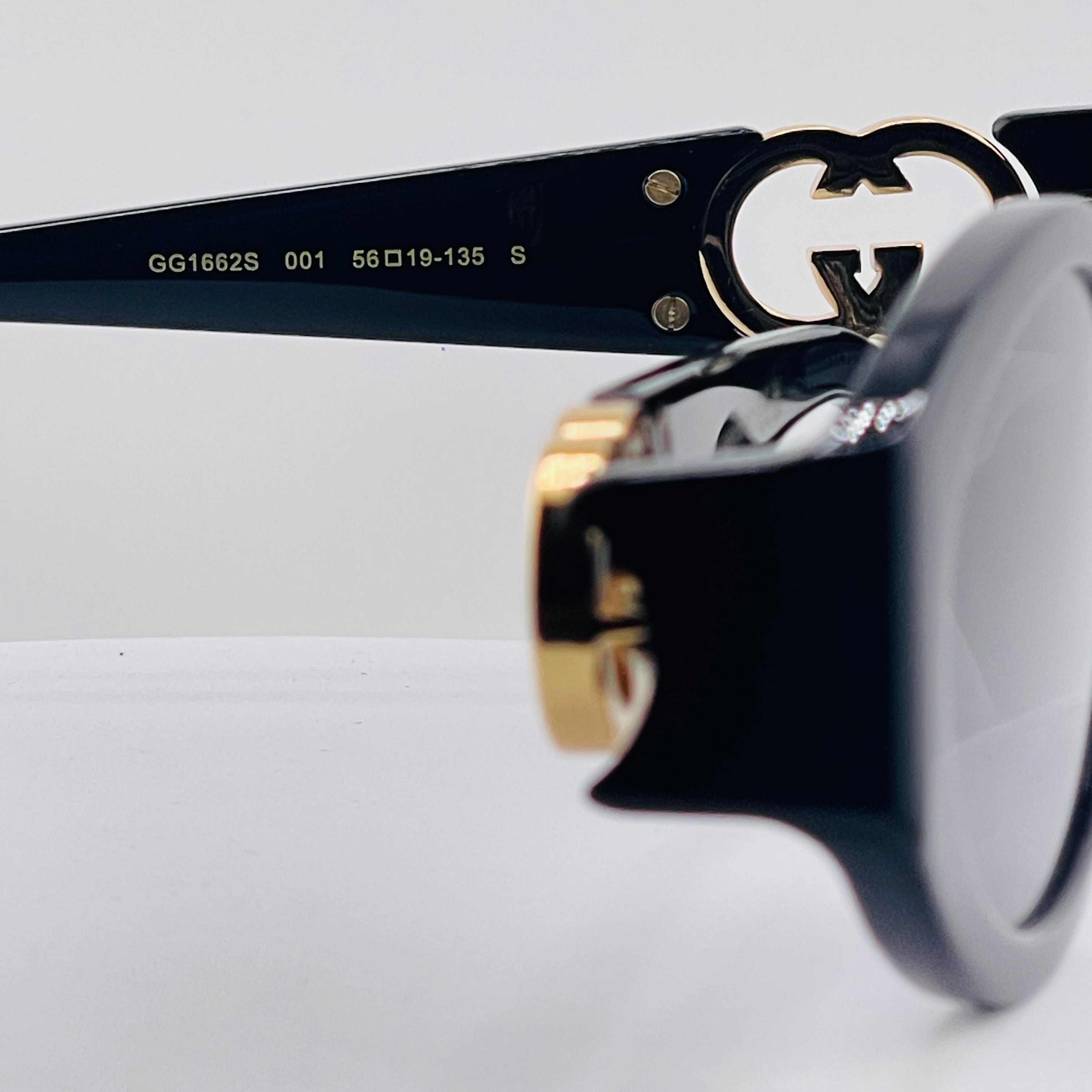 Gucci Oval Frame Sunglasses – Black & Gold