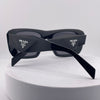 Prada Symbole Sunglasses – Black Acetate Frame